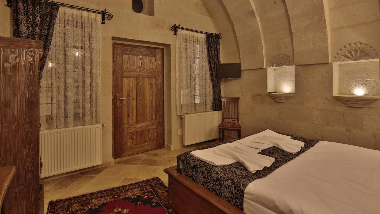 Cappadocia Cave Land Hotel Гьореме Стая снимка